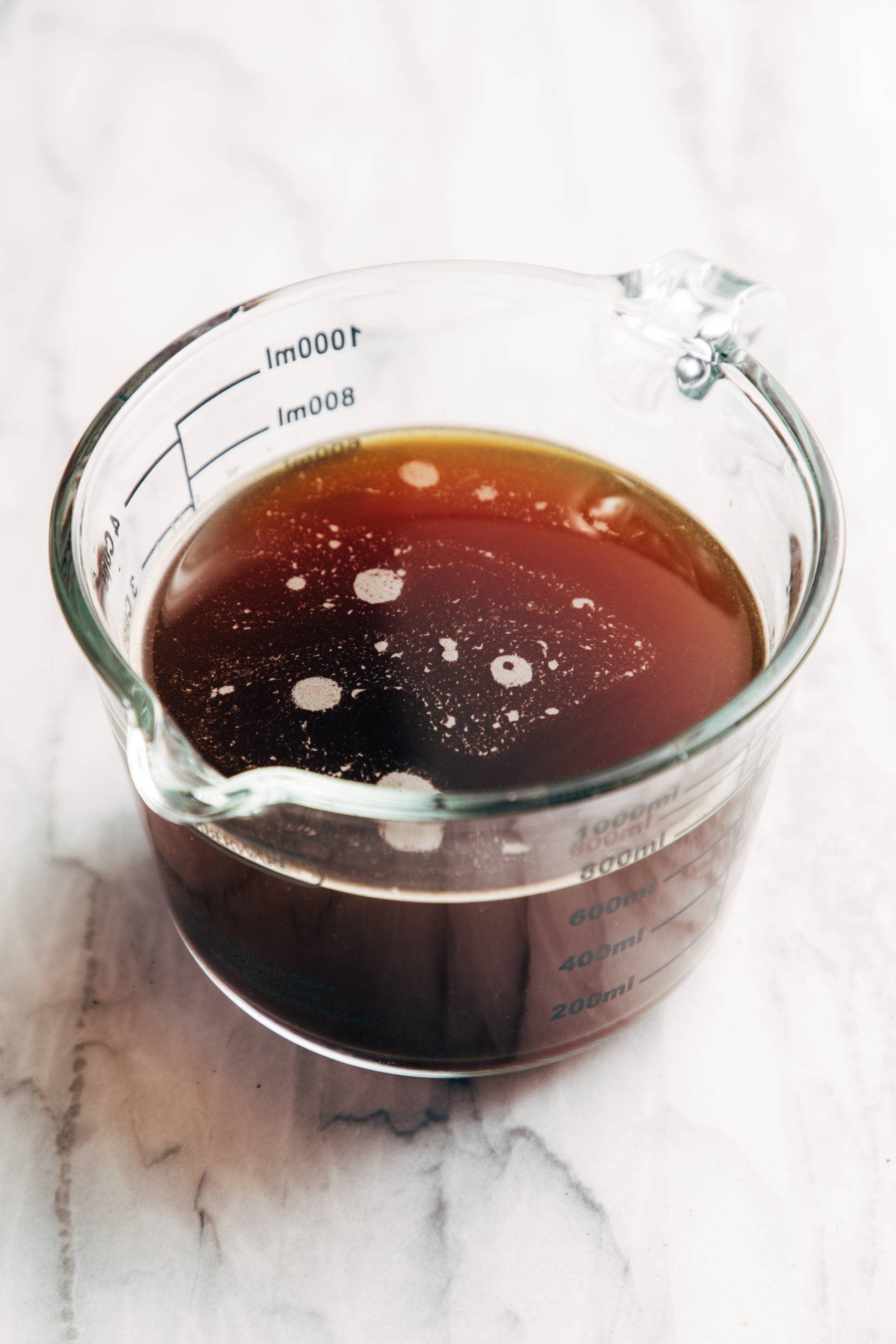 Cold brew in a measuring cup