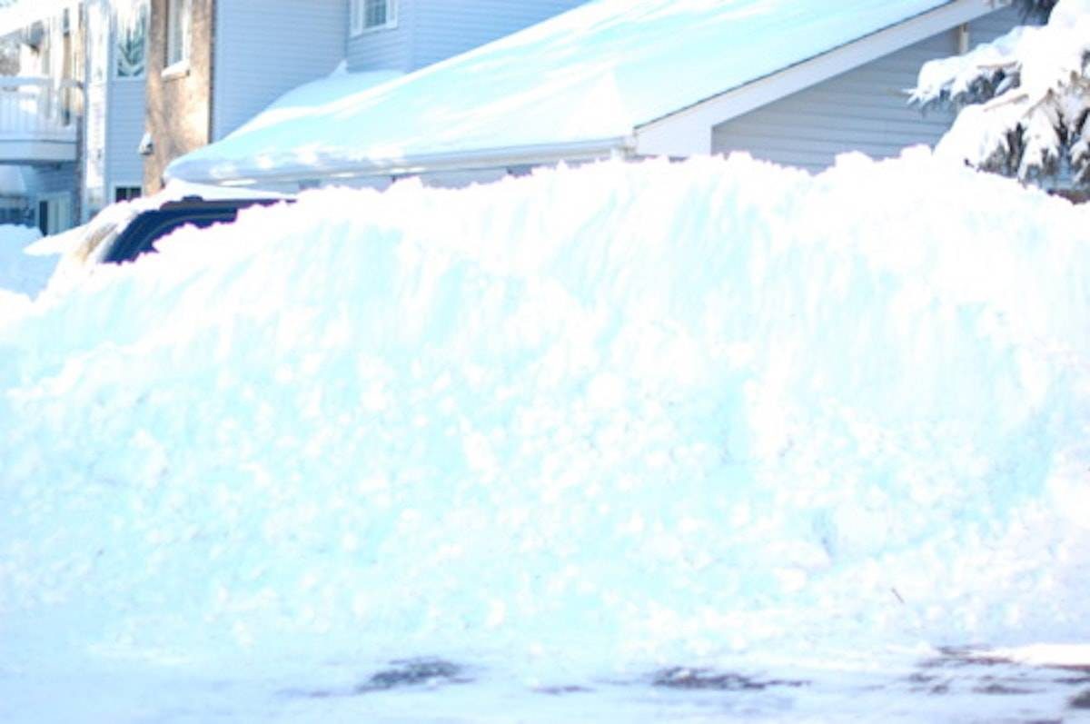 Large bank of white snow covering the ground.